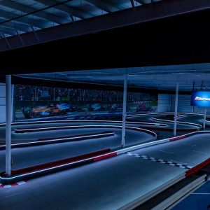 the indoor kart track at k1 speed canton with lights off and led lights on